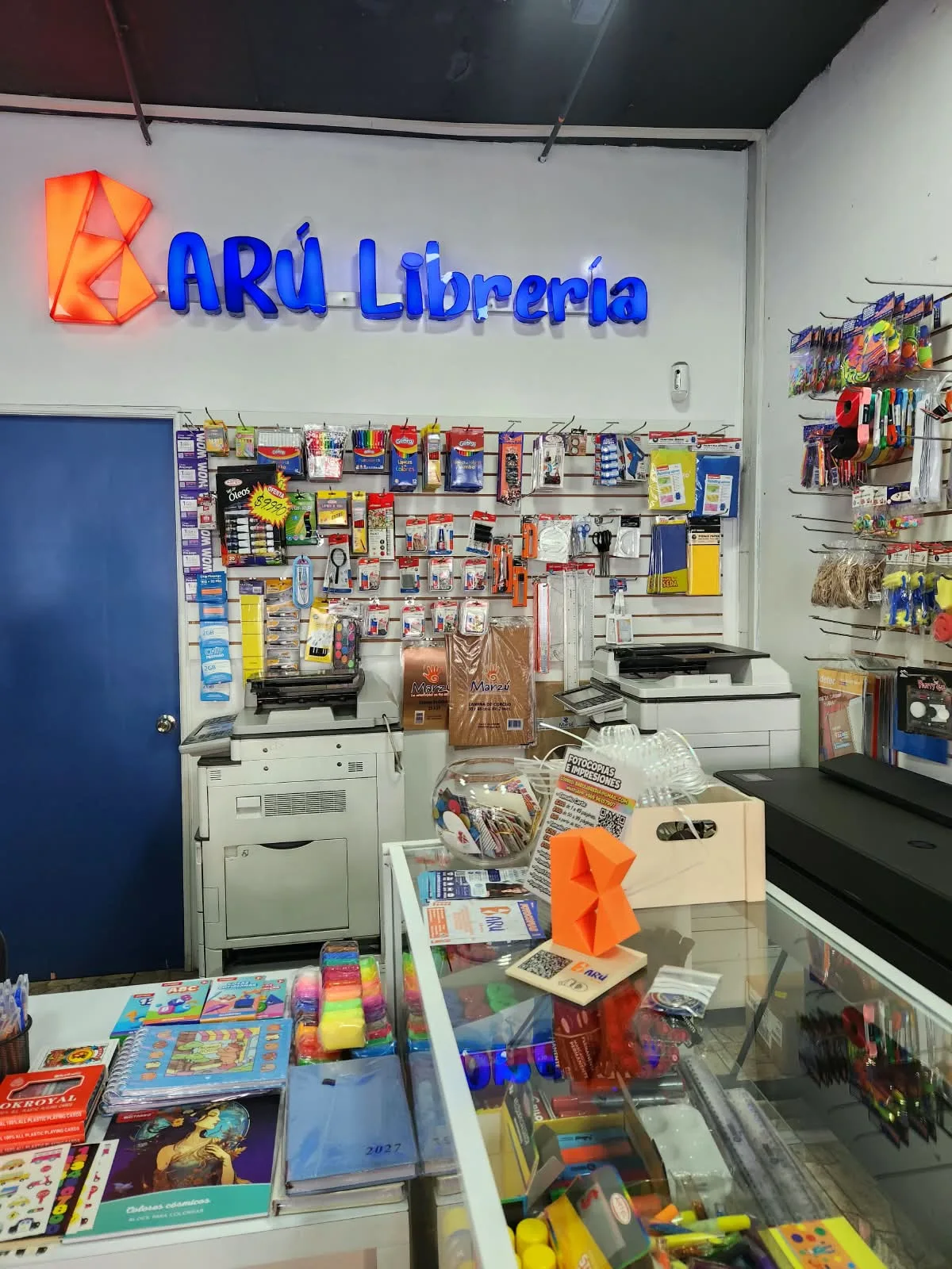 Barú Librería por dentro, con su stand Nexo Tap en el mesón